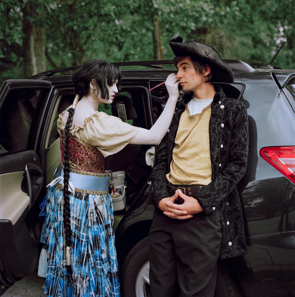 Picture of Woman in Medieval Costume Applying Make-up on Pirate by SUV_