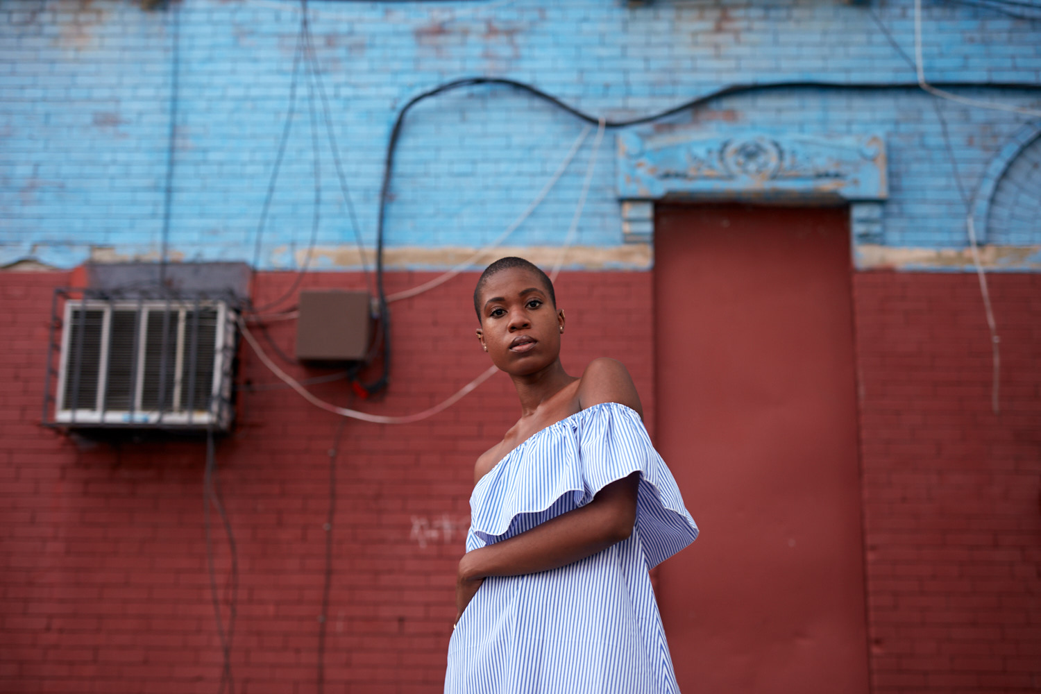 Brooklyn Fashion Photographer | Black Model with Shaved Head in Blue Striped Dress