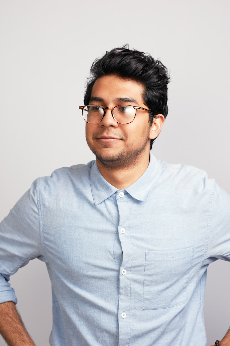 Creative, Editorial-Style Headshots of Young Man in Glasses for Healthline NYC