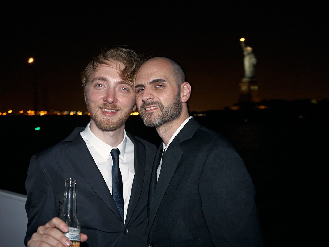 Gay couple David and Kevin have upscale wedding ceremony on luxury yacht sailing around the Hudson River and Manhattan New York City