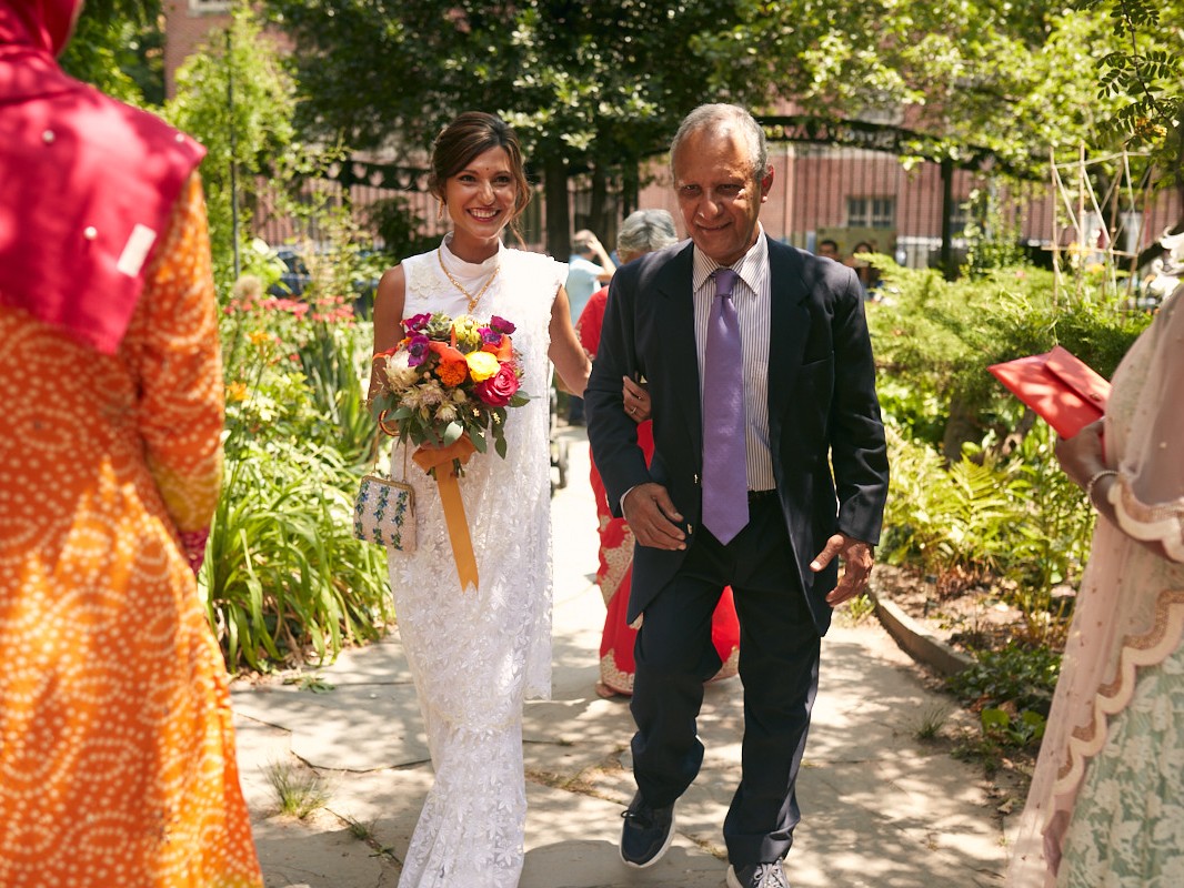 Interracial couple has Indian wedding and married in community gardens in NYC