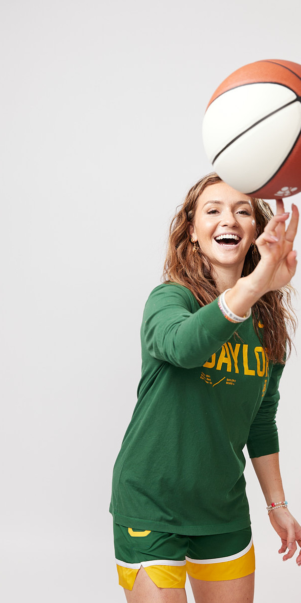 Baylor Women's Basketball Player Spinning Ball in Studio for Cross Branding Campaign. Waco, Texas