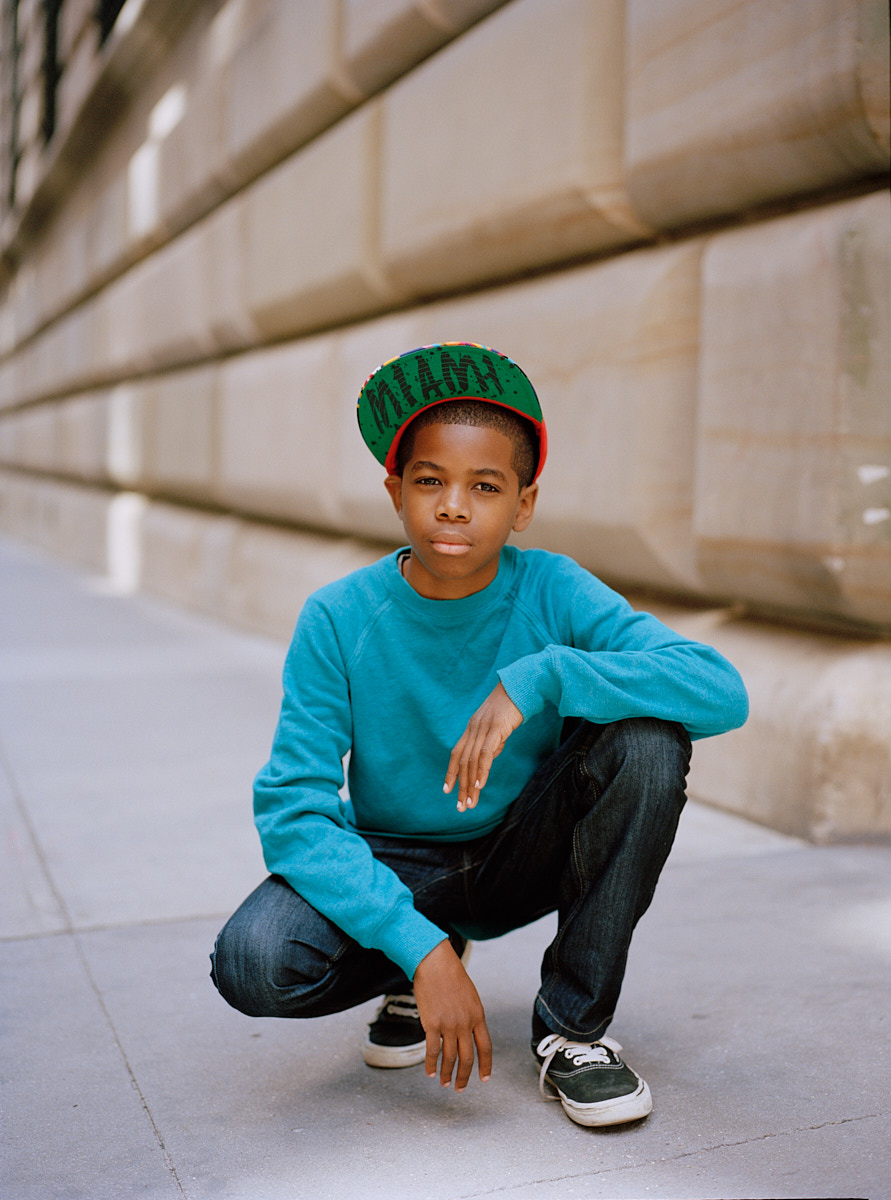 Portrait of Young Black Boy in Cap On Street - Dallas Portrait Photographer