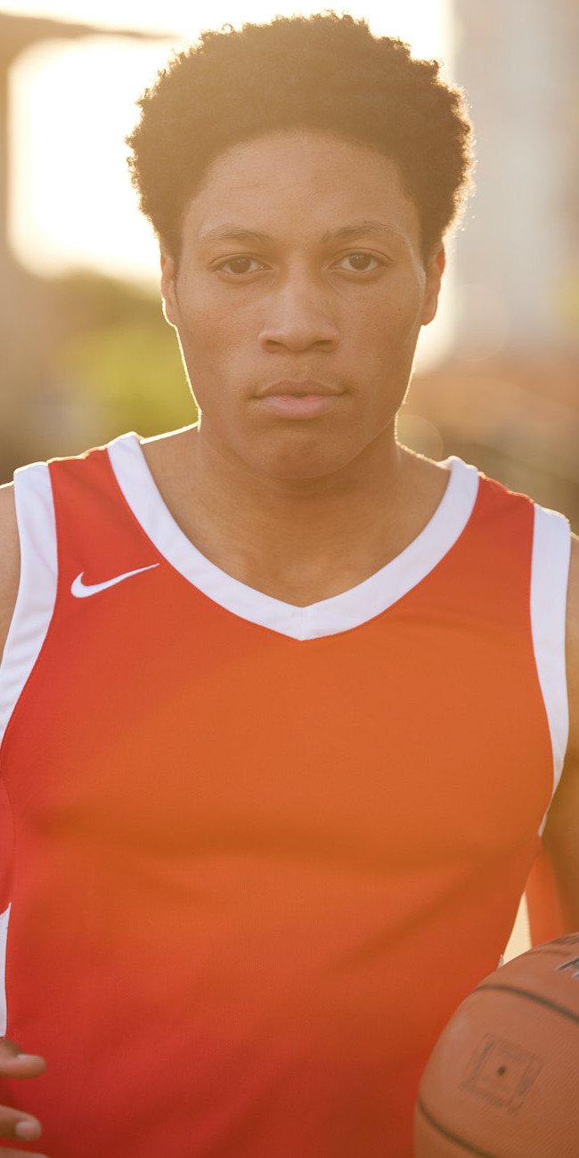 Sports Lifestyle Photographer Dallas - Portrait Young Black Man with Basketball