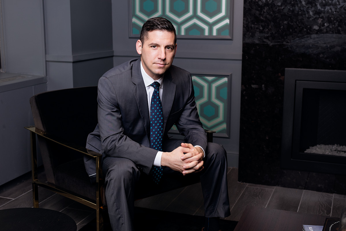 Environmental Business Portraits for Professional Impact - Young CEO in Powerful Pose